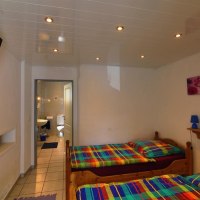 Schlafraum mit Blick zum Bad Schlafraum mit Blick zum Bad